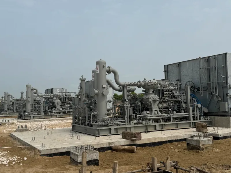 Compressor package with cooler set on its concrete foundation